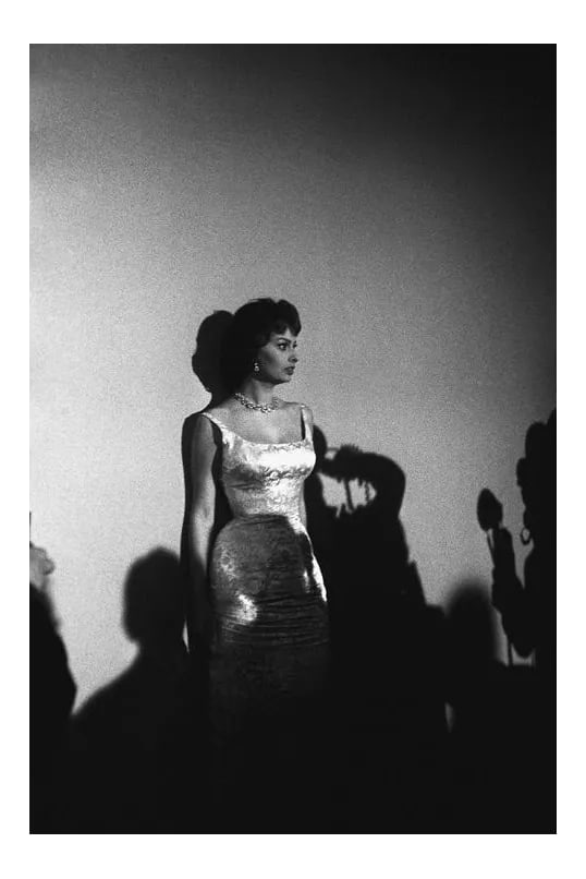 Sophia Loren at "The 30th Annual Academy Awards" 1958 (Photo by Sid Avery): Sophia Loren poses for photographers at "The 30th Annual Academy Awards, 1958. 11" x 14" silver gelatin fiber based print signed on verso by the photographer, Sid Avery. Edition #02 out of 70.