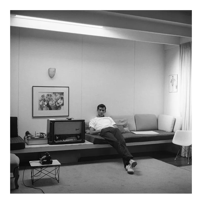 Anthony Perkins at Home in Los Angeles 1959 Photograph by Sid Avery: Anthony Perkins at home in Los Angeles, 1959. 11" x 14" silver gelatin fiber based print signed on verso by the photographer, Sid Avery. Edition #13 out of 70. This is an unframed print. Condition: