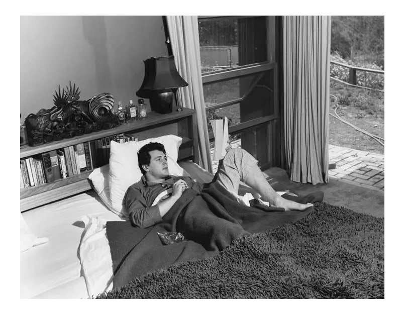 Rock Hudson at His North Hollywood Home 1952 (Photo by Sid Avery): Rock Hudson at his North Hollywood home, 1952. 11" x 14" silver gelatin fiber based print signed on verso by the photographer, Sid Avery. Edition #13 out of 70. Condition: Imperfections: No