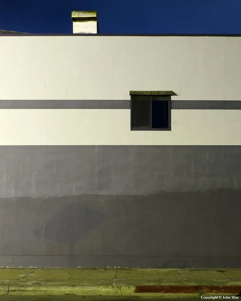 Contemporary Night Photograph "Gray Wall" by John Vias: "Gray Wall" is a beautiful photograph by John Vias. This photograph creates an inviting composition from an otherwise ordinary environment. Note from the artist, John Vias: "Anyone can learn to see