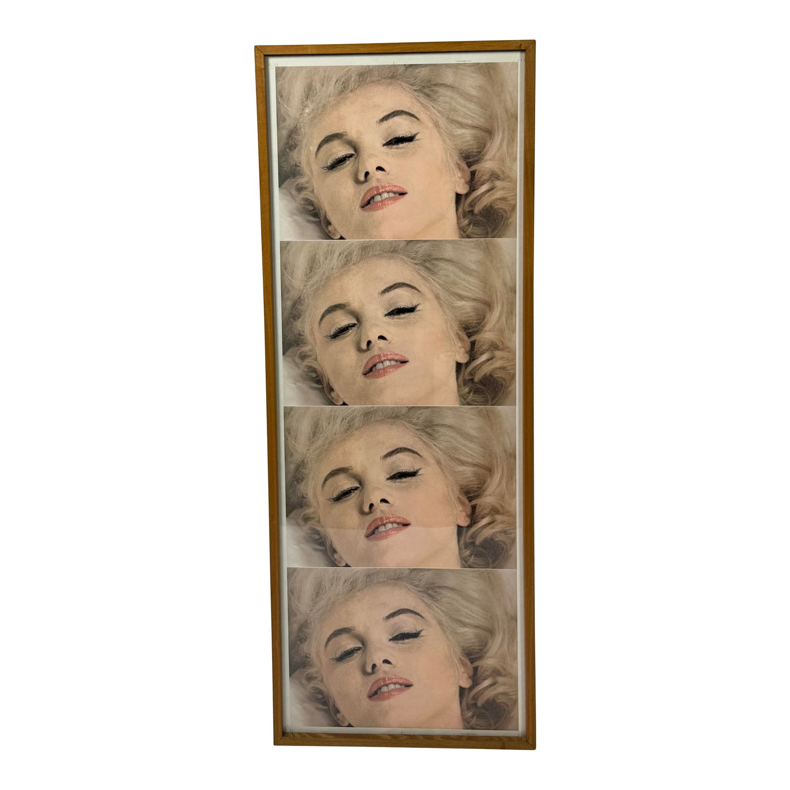 Mid 20th Century Framed Marilyn Monroe Photography: A rare and visually captivating double-sided artwork featuring photographic prints of Marilyn Monroe. The front side presents four close-up portraits capturing her in a soft, dreamlike expression,