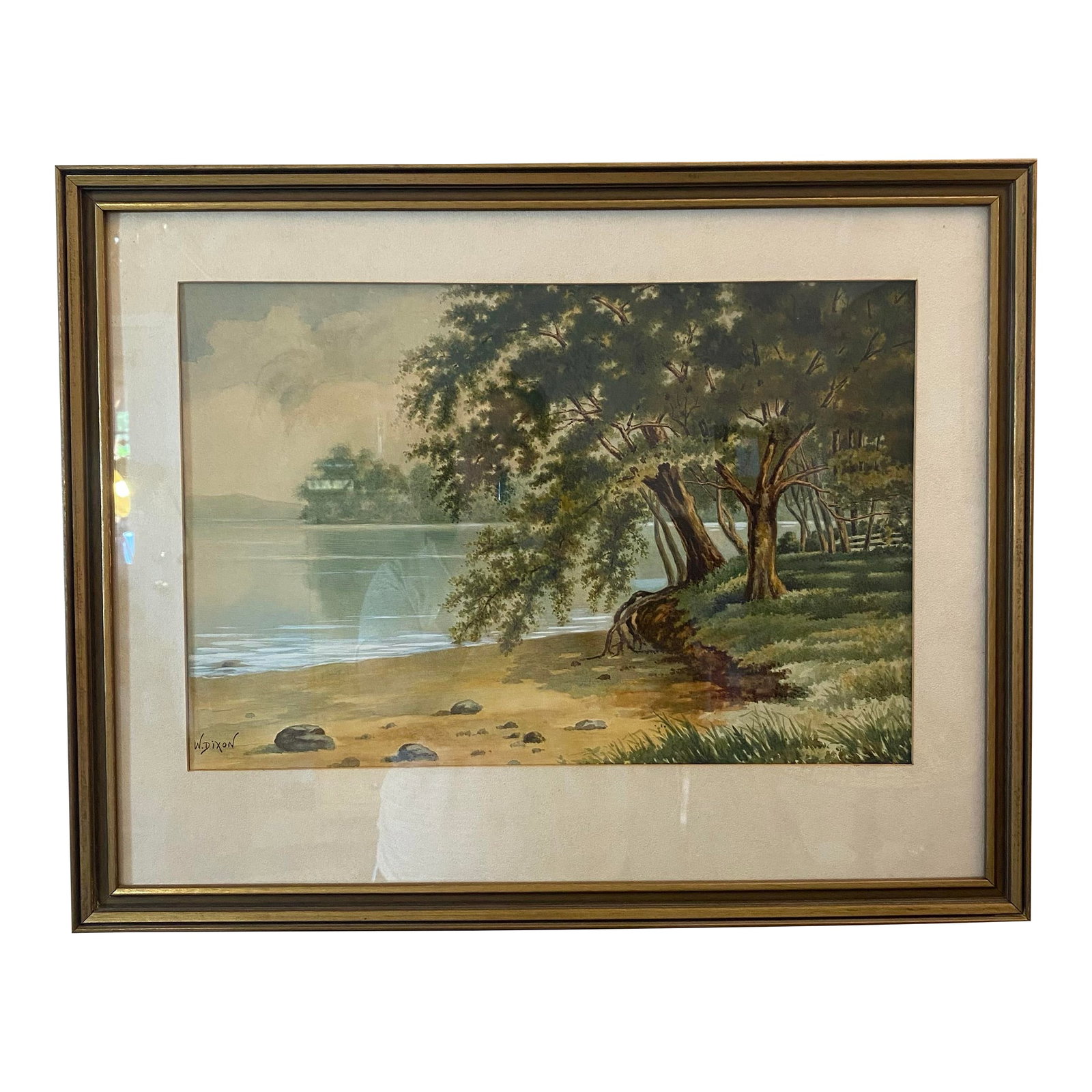 Vintage Mid-Century Landscape Watercolor Lake Scene Framed Wall Art Signed W Dixon: Vintage W Dixon Signed Landscape Watercolor Lake Scene Framed Wall Art A tranquil vintage watercolor landscape signed W. Dixon, depicting tall shoreline trees leaning toward a calm reflective lake. Th