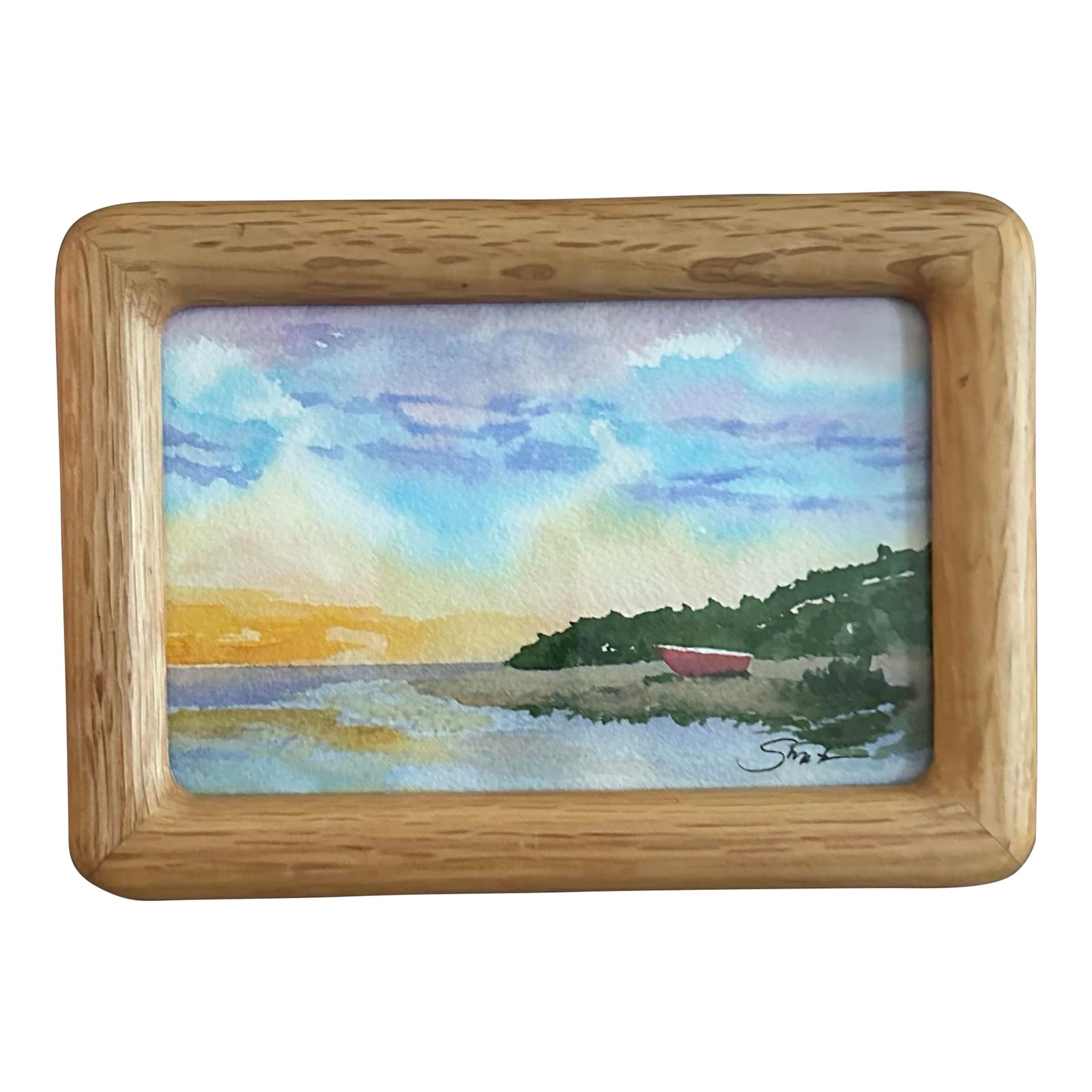 "Evening by the Shore" Framed Signed Original Watercolor Seascape by Nancy Smith: This petite landscape watercolor captures a tranquil coastal scene bathed in the soft glow of sunset. Framed in natural wood, it evokes peaceful solitude and timeless beauty. A signed original