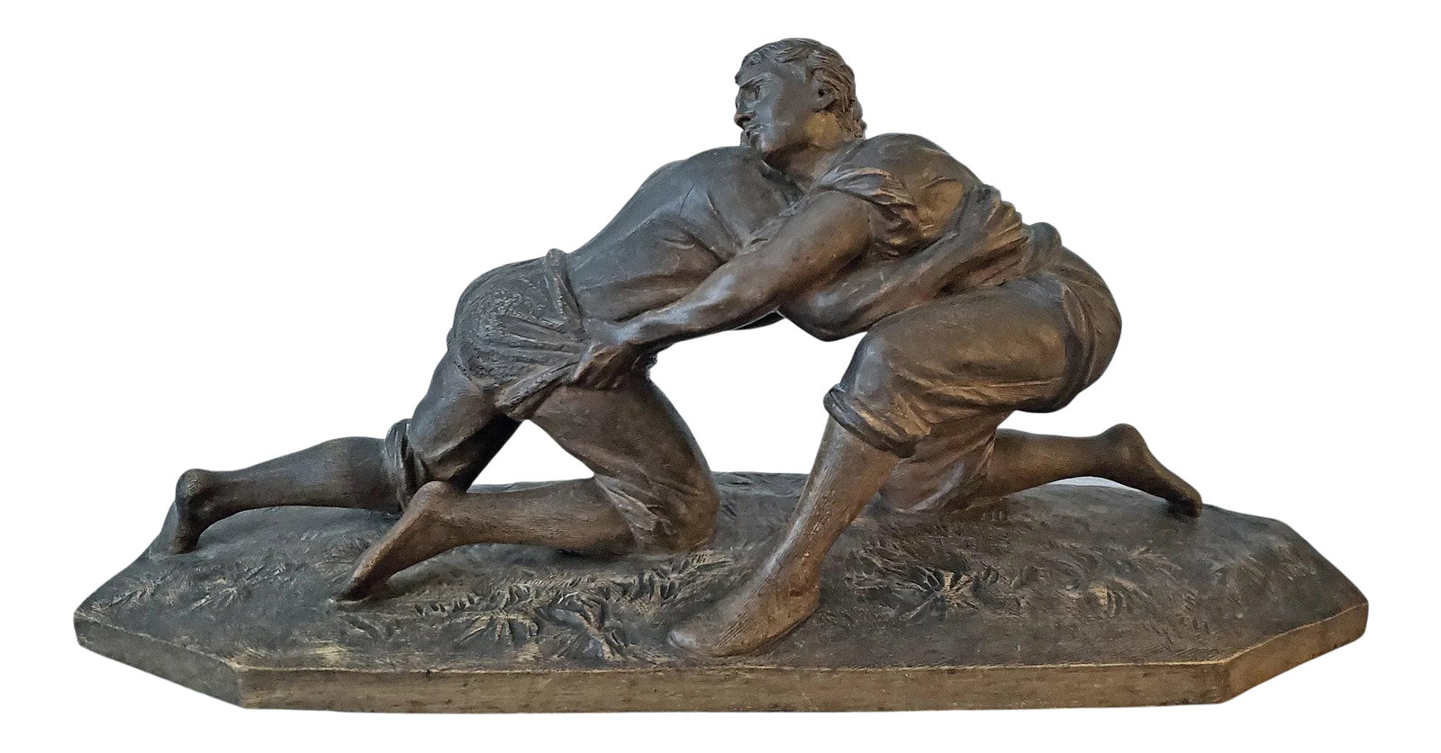 19th Century Carved Wooden Sculpture of Two Male Wrestlers: This is a fine late 19th century carved wooden sculpture depicting two wrestlers. The work is finely detailed and very expressive in a heated moment of a match. The figures are wrestling on a patch