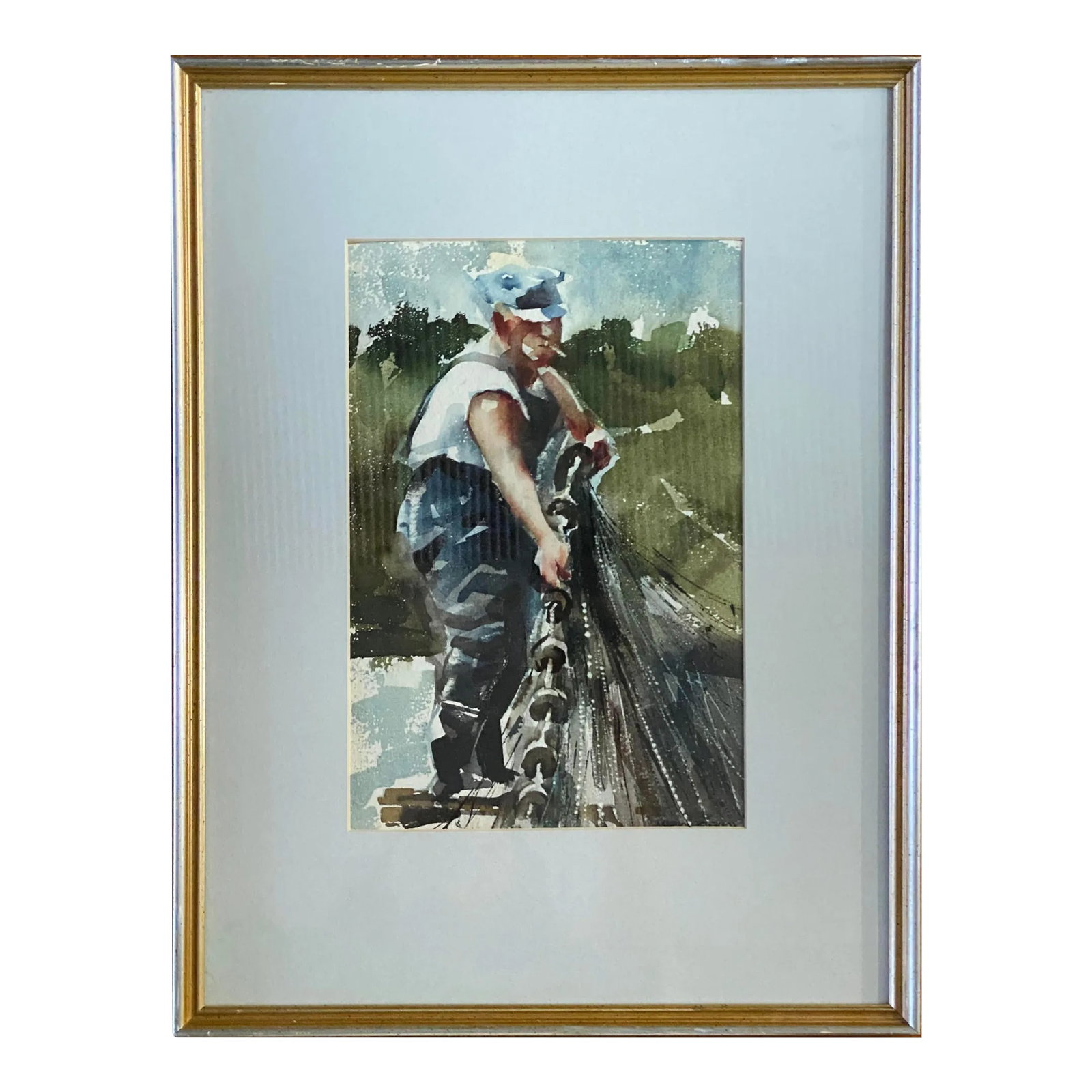 "All in a Days Work" Vintage Watercolor Painting Framed: A vintage water color painting of a fisherman reeling in the fish net. You can see the details in the netting and the fisherman's clothes. It is framed in a beautiful emerald green and gold antique fr