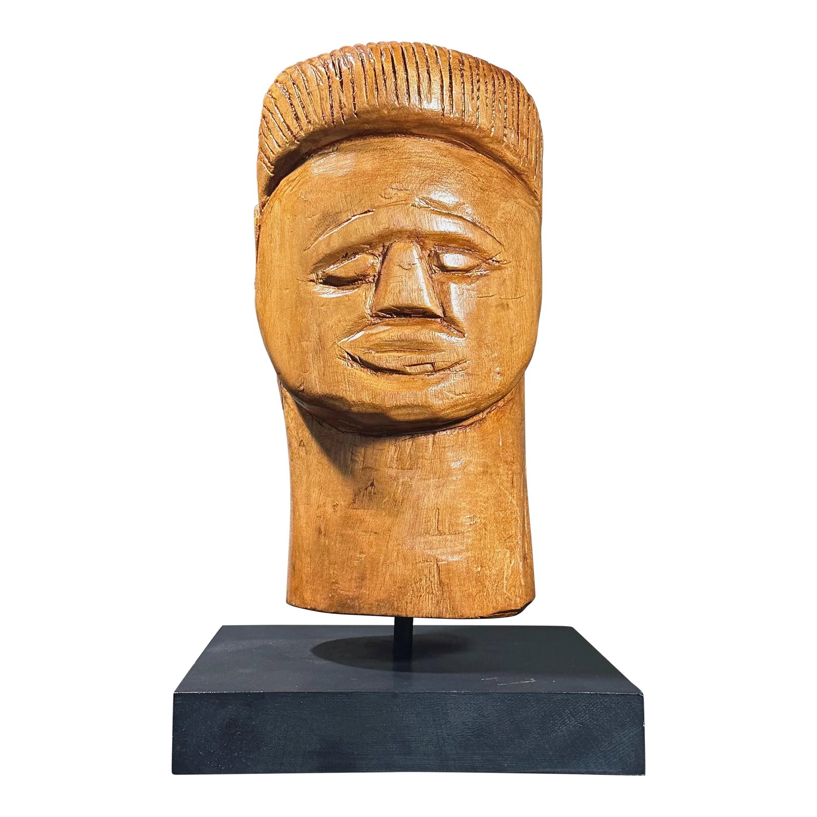 Vintage Hand Carved Brazilian Ex-Voto Folk Art Portrait Sculpture on Stand: Vintage Hand Carved Brazilian Ex-Voto Folk Art Portrait Sculpture on Stand. Hand carved in blond wood. Sits on a black wood stand. In good condition with wear consistent with age. A 3" scratch on the