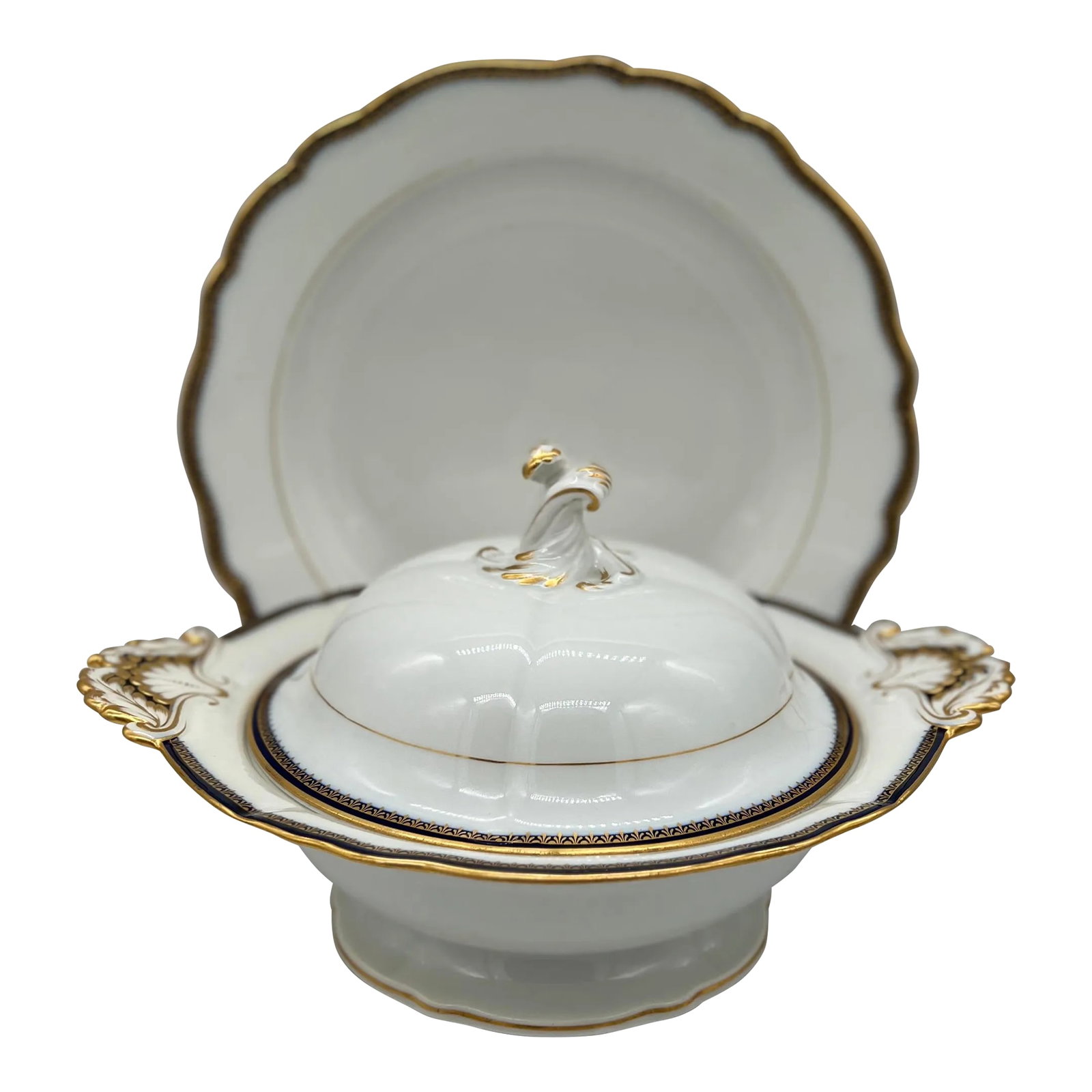 2 Pc, Meissen Porcelain Cobalt & Gold Rim Decorated Soup Tureen, Under Platter: 2 Pc, Meissen Porcelain Cobalt & Gold Rim Decorated Soup Tureen, Under Platter. The soup tureen is classic porcelain white and decorated to the rim and accents with cobalt and gilt overlay. The