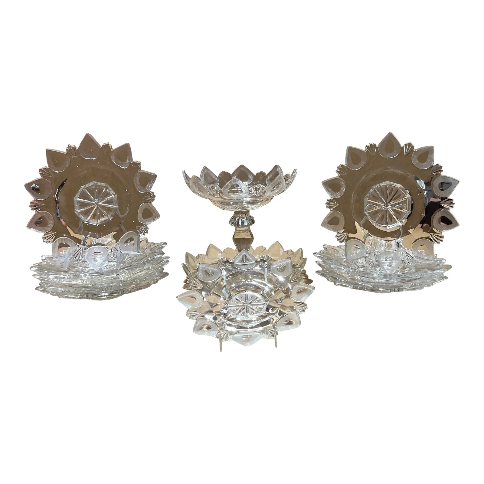 Exceptional 12 Piece American Brilliant Cut Glass Dinner / Dessert Service: Likely American, possibly Irish. 19th Century. This is absolutely exceptional set of cut glass in an unidentified pattern. The 12-piece set includes nine 10.125" dinner plates, one 9" plate, a 10.5"