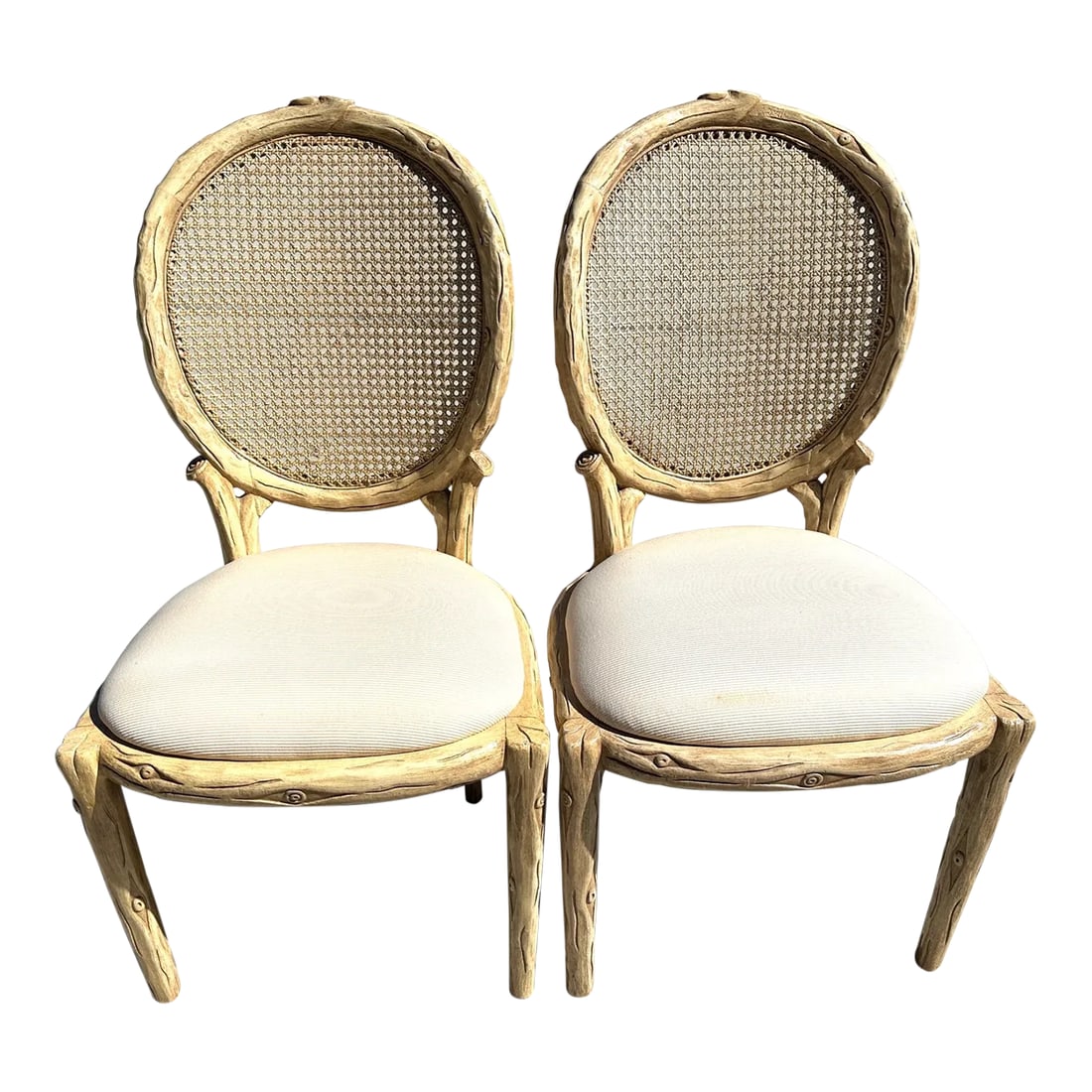 Faux Bois Cane Back Dining Chairs-A Pair: Pair of Faux Bois Upholstered Seat Dining Chairs. Seat is in a cream color with a textured ribbed fabric. Mix and match with other faux bois chairs. Thick wood with a clear lacquer finish. 20.5in w x 