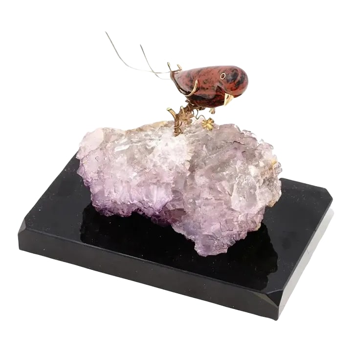 Vintage Jasper Bird With Gold Mounts on Amethyst Base: A vintage carved jasper bird with gold mounts showcasing the skill of lapidary artists who transform natural materials into breathtaking sculptures. The addition of gold mounts adds a touch of luxury 