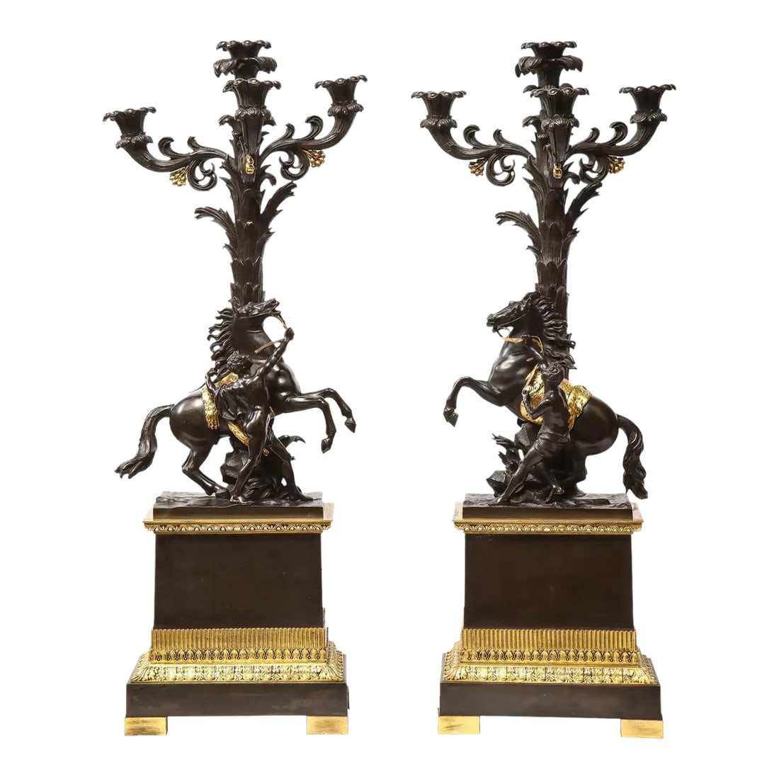 Large Pair of Early 19th Century French Restauration Ormolu and Patinated Bronze Candelabra, Horses: A large and fine pair of French restauration ormolu and patinated bronze four-light candelabra, with Marly Horses, after Guillaume Coustou, circa 1820. Very fine, elegant and chic. This pair can be