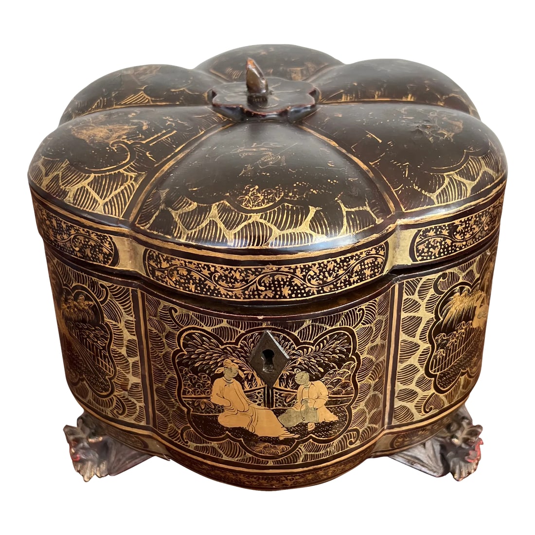 19th Century, Chinese Export Gilt Black Lacquer Melon Form Tea Caddy Box: Chinese, 19th century. Chinese lacquer and gilt decorated melon form tea caddy chest or box. The piece is heavily decorated with chinoiserie windows and supported by three giltwood carved dragon