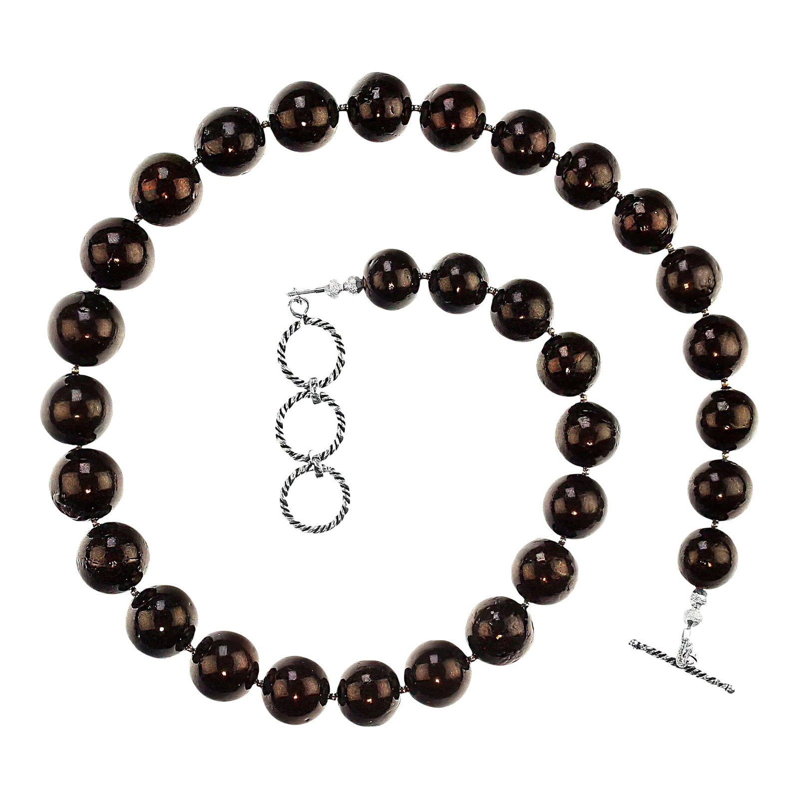 Gently Graduated Black Gemstone Necklace With Sterling Accents: Black Smooth 12-15mm Graduated Gemstone Necklace with Sterling Silver Accents and Bali Silver Toggle Clasp (19-20 Inches) Elevate your style with this elegant black gemstone necklace, featuring