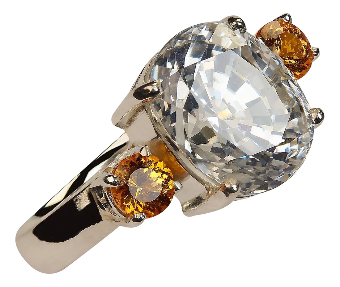White Genuine Zircon and Mandarin Garnet Ring: Stunning Sterling Silver Ring with White Zircon and Orange Mandarin Garnets Turn heads with this exquisite Sterling Silver ring, featuring a breathtaking 8.92-carat genuine white Zircon accented by