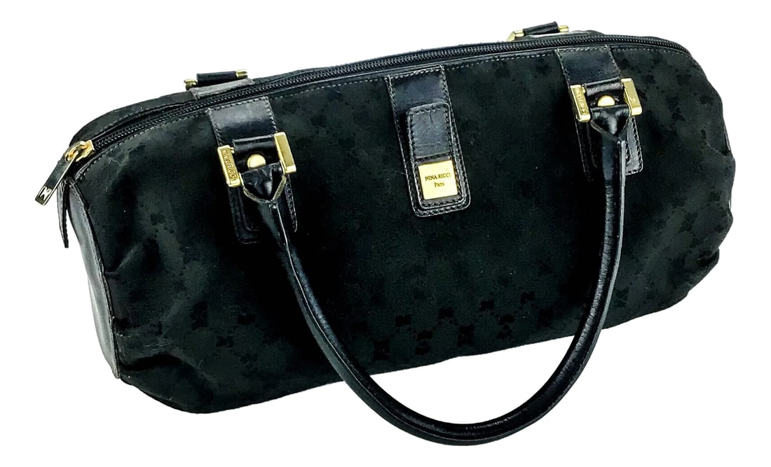 Nina Ricci Signature Canvas Top Handle Boston Bowling Bag: NINA RICCI - monogram black boston handbag. This purse is a classic. Go from day to evening with this iconic classic bag. In wonderful condition, clean, sturdy and ready to use. Top zipper closure for