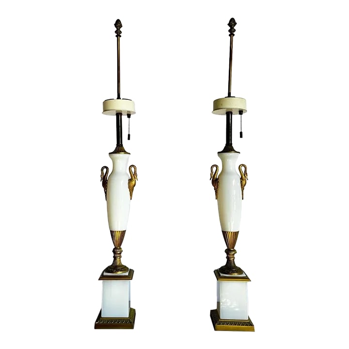 Antique French Opaline White Glass and Gold Lamps - a Pair: Elevate your space with this exquisite pair of antique French lamps featuring opaline white glass and ornate gold accents. The swan-shaped handles and intricate details exude a regal charm, while the