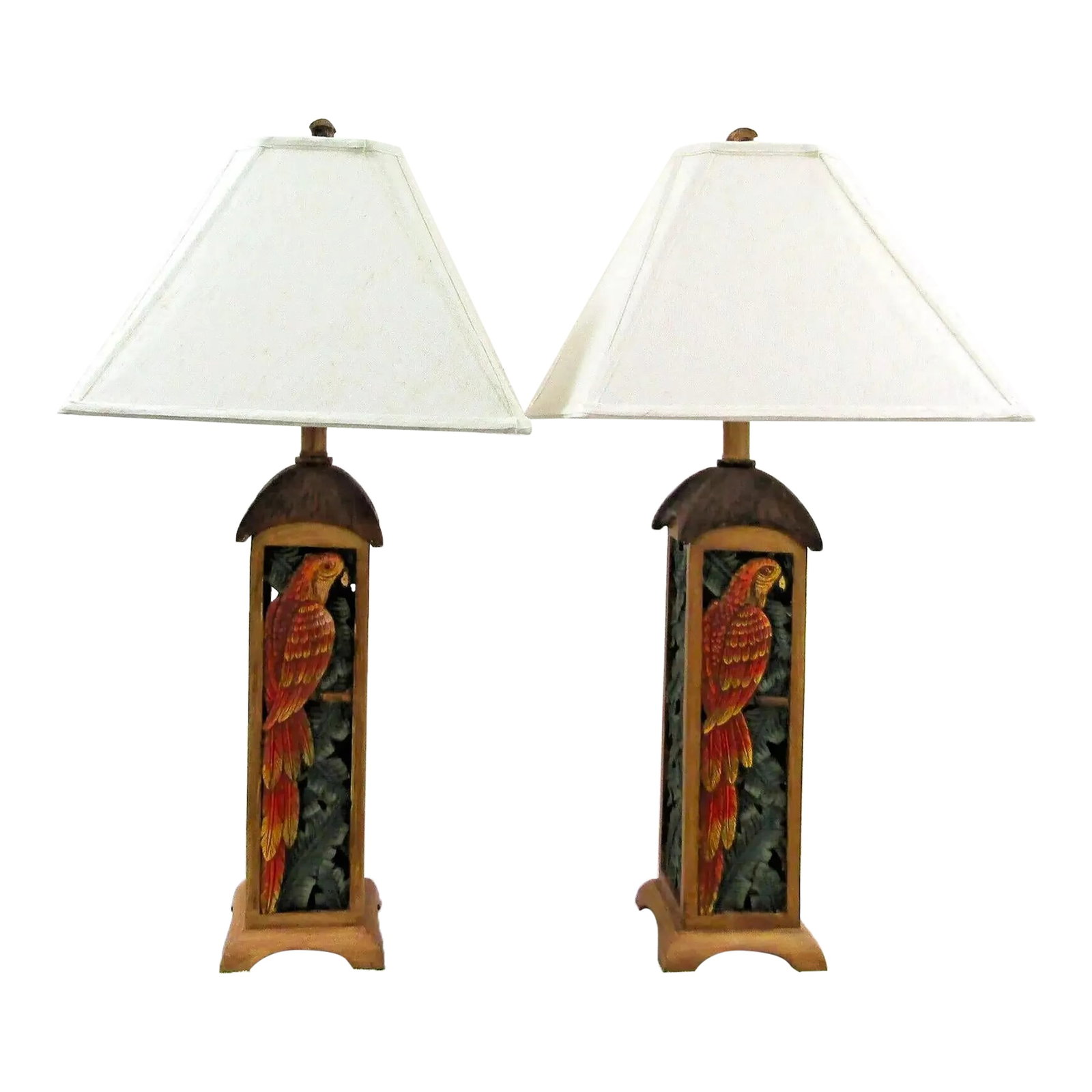 Matched Pair of Parrot Motif Table Lamps With Custom Linen Shades Attributed to Tommy Bahama: Matched Pair of Tommy Bahama Reticulated Parrot and Palm Leaf Motif Table Lamps with Custom Bevelled Pyramid Linen Shades Pair of large lamps with a perched parrot and palm leaf reticulated design.