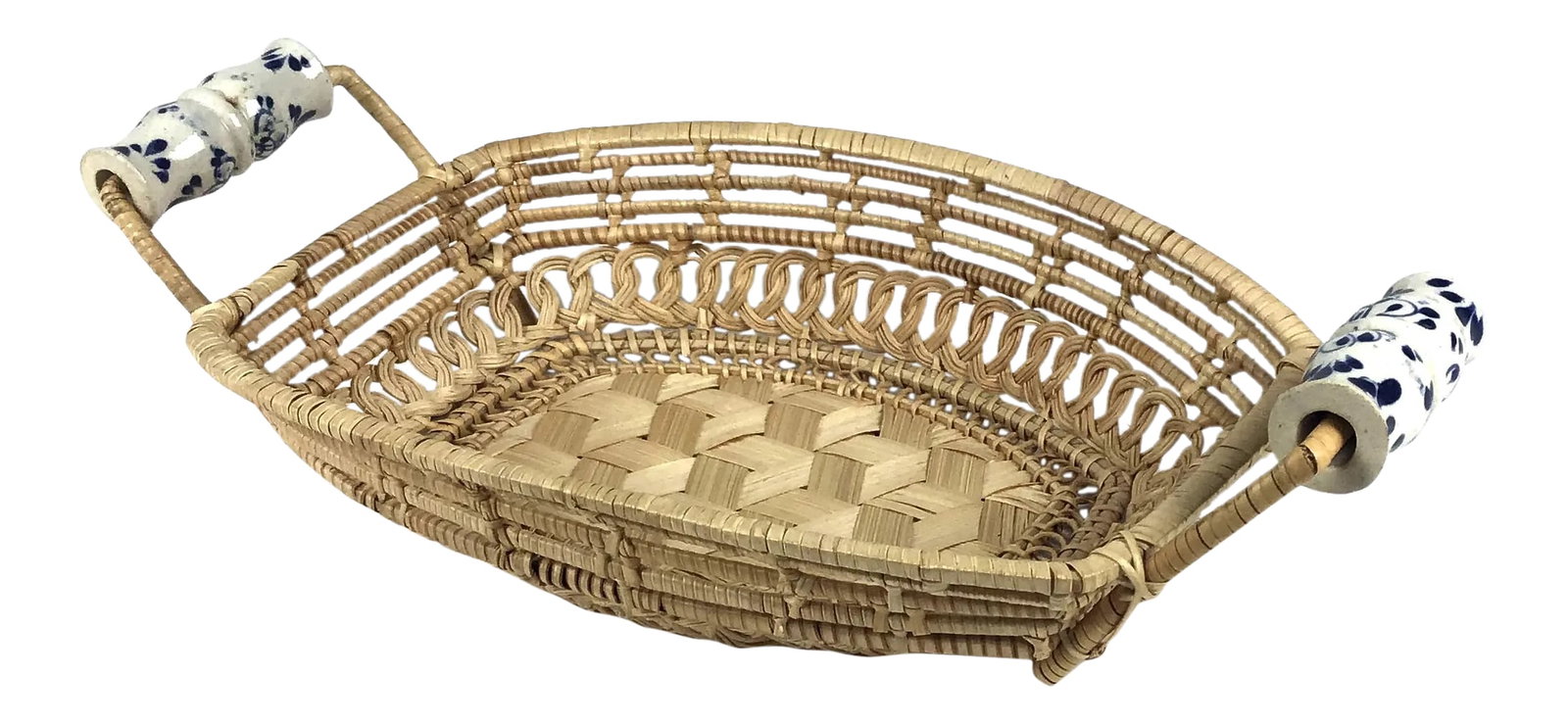 Antique Basket With Delft Ceramic Handles: This antique basket is in unbelievably great condition. It has porcelain Delf Design handles and the design is very traditional. There are at least 6 types of weaving patterns included. Perfect for