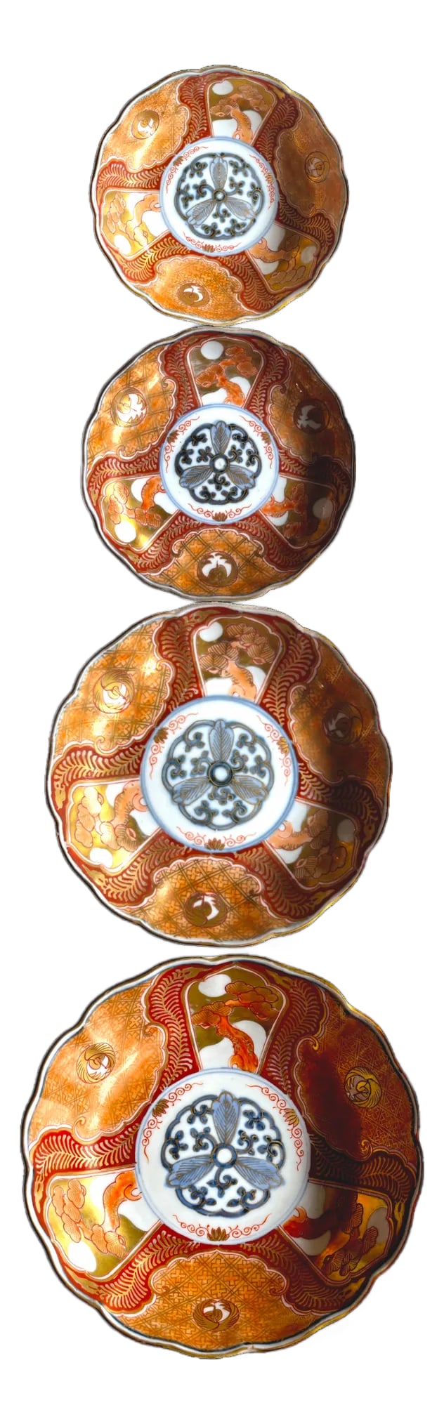 19th Century Japanese Meiji Period Marked Imari Fluted Footed Nesting Bowl Blue Fuku Mark Arita- Set: Stunning set of four nesting Imari bowls, richly decorated with traditional Japanese motifs. The pieces features a scalloped rim and symmetrical radial design that draws the eye inward. The interior