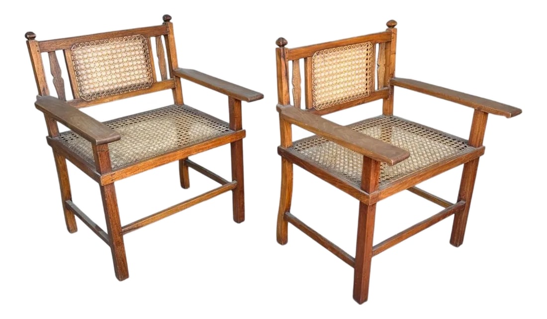 Early 20th Century Antique British Colonial Pair of Wood and Caned Chairs: Antique pair of British Colonial wood and caned chairs. Exquisite workmanship. Condition: Alterations: Original Condition Unaltered Imperfections: Some Imperfections Condition Notes: Wear and patina c