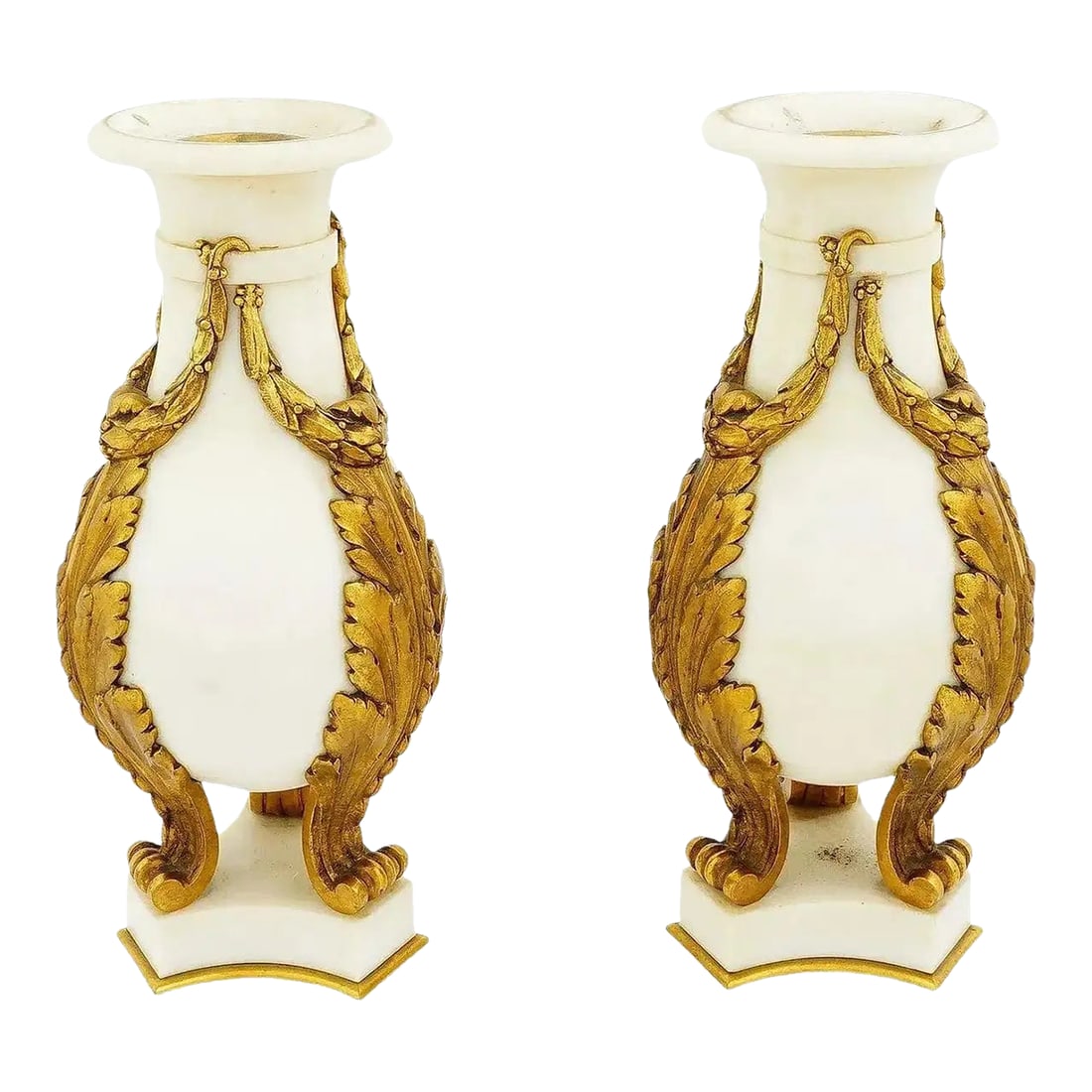Antique French White Marble and Gilt Bronze Cassolettes - a Pair: A pair of antique French white marble and gilt bronze cassolettes. Each is shaped as an urn of baluster form, adorned with applied laurel ribbons on top and acanthus leaves extending downward to form 