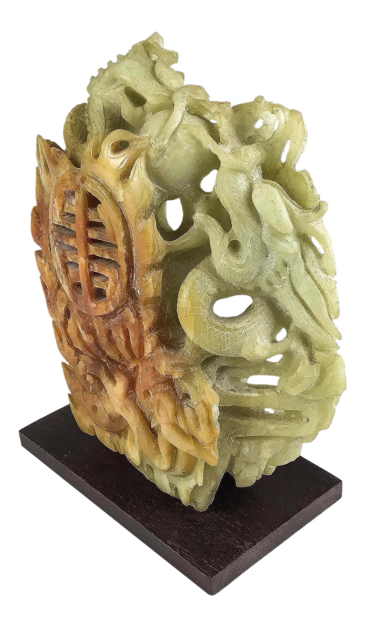 Chinese Celadon & Russet Jade Boulder Carved With 2 Dragons: A single block of jadeite has been intricately carved with 2 intertwined dragons in fierce competition pursuing a flaming Pearl. Beautifully detailed and carved so no matter which direction you look a