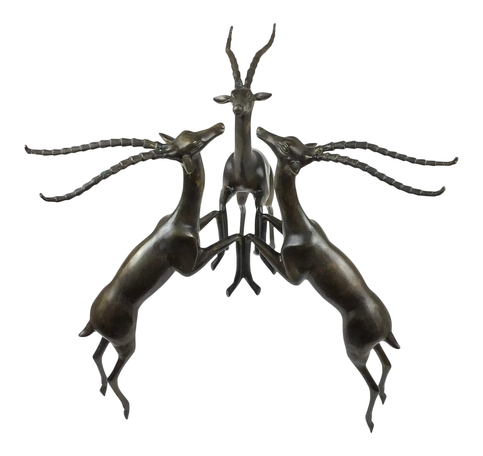 Vintage Bronze Deer Sculpture Coffee Table Base: 3 playful deer gather head to head forming a work of art or a unique table base. Simply add a piece of glass to the deer's heads and you have a beautiful work of art that also functions as a table.