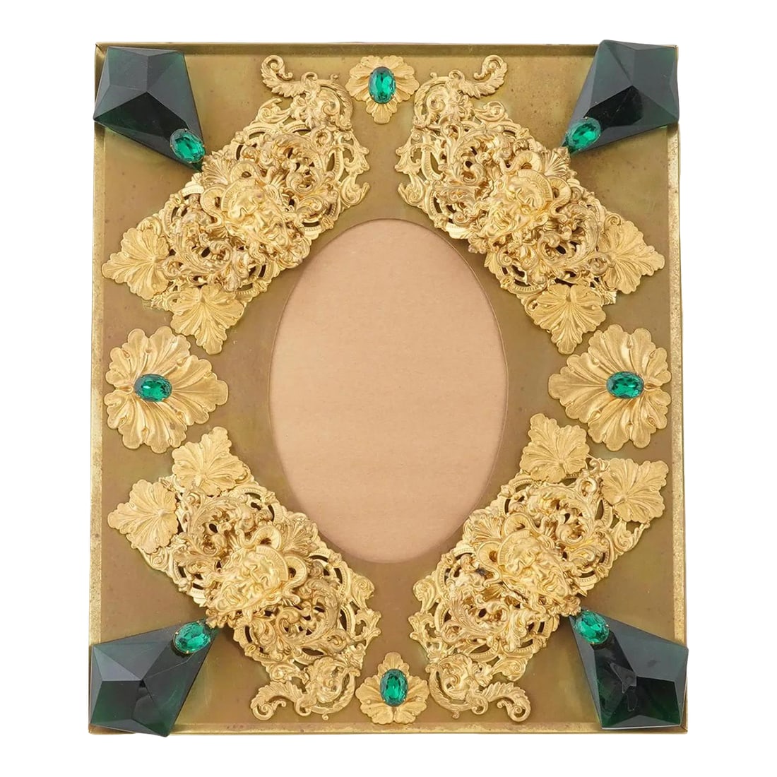 Early 20th Century Relief Design Gilded Brass Picture Frame, Marked: A vintage gilded brass picture frame. The frame features a relief design, adorned with decorative elements that include green stones, set against the gold tone background. The ware is decorated with