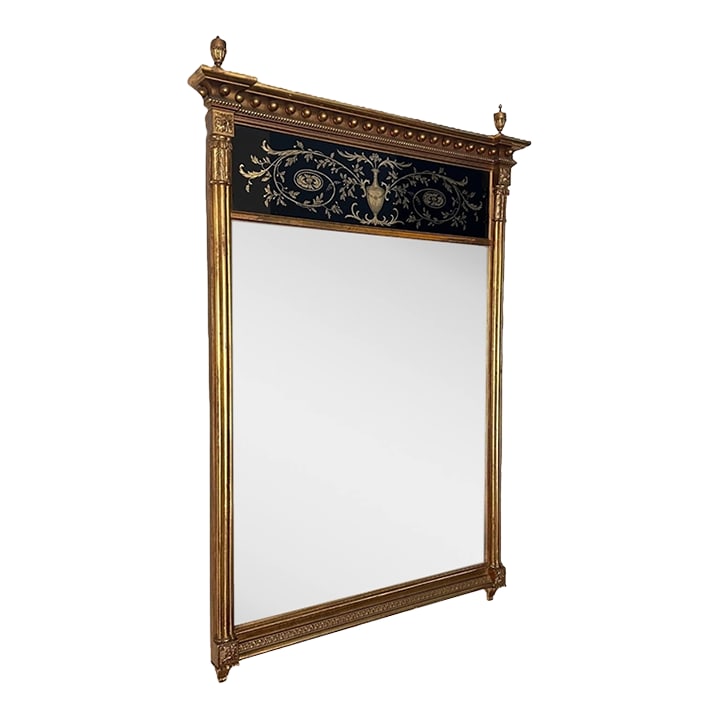 Gilt Regency Style Wall Mirror – 32" W × 47" H: A beautifully crafted Regency-style gilt wall mirror featuring classic architectural details and richly preserved decorative elements. The frame includes fluted column sides, carved floral corner