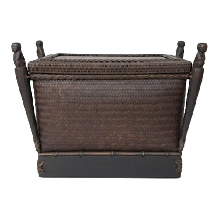 Mid-20th Century Thai Woven Rattan Basket Table With Carved Figures: Bring rich organic texture, history, and authentic global artistry to your interior design with this exceptional mid-20th century Thai rice basket storage table. This rare statement piece is expertly