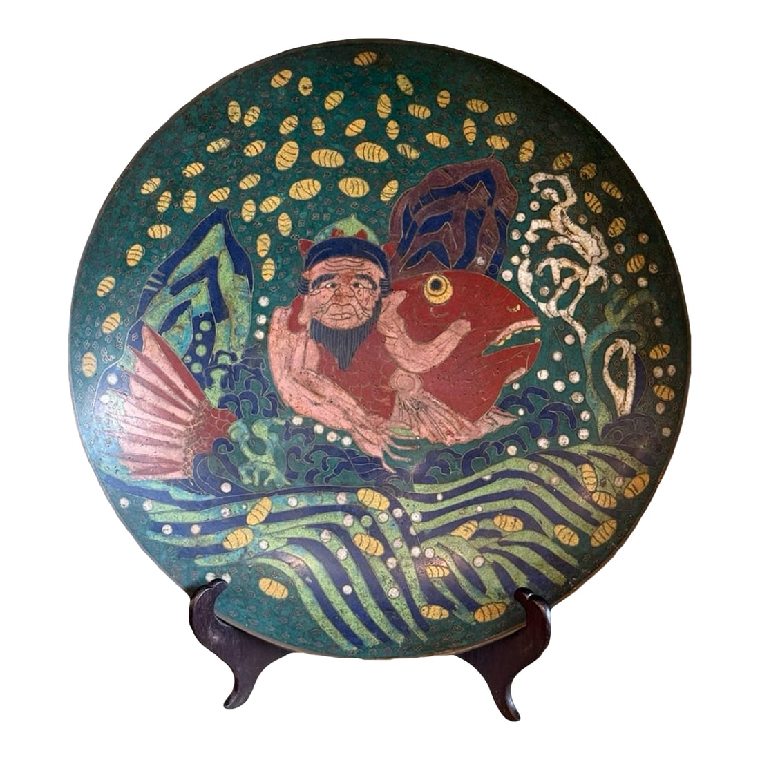 Meiji Japanese Cloisonne Charger Urashima Taro Riding the Sea Bream Mythological: Early Meiji Japanese cloisonne enamel charger measuring 15 inches in diameter, depicting the famous folktale of Urashima Taro. Shown riding a red sea bream across stylized waves, the figure is