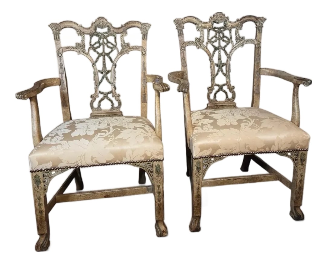 1990s Pair of Hickory Armchairs: This pair of armchairs is from the Hickory Chair Company and called Emma. They have an ornately carved wood frame with tromp l'oeil woven ribbon and bow motif and were designed by Thomas O'Brien.