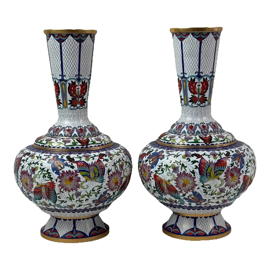 Pair of Chinese Cloisonne Enamel Vases Lotus White and Floral Butterflies: Pair of Chinese cloisonne vases of bulbous form with long necks, decorated with multicolored lotus and foliate designs on white and blue backgrounds with gilt rims. 15" Condition: Alterations: