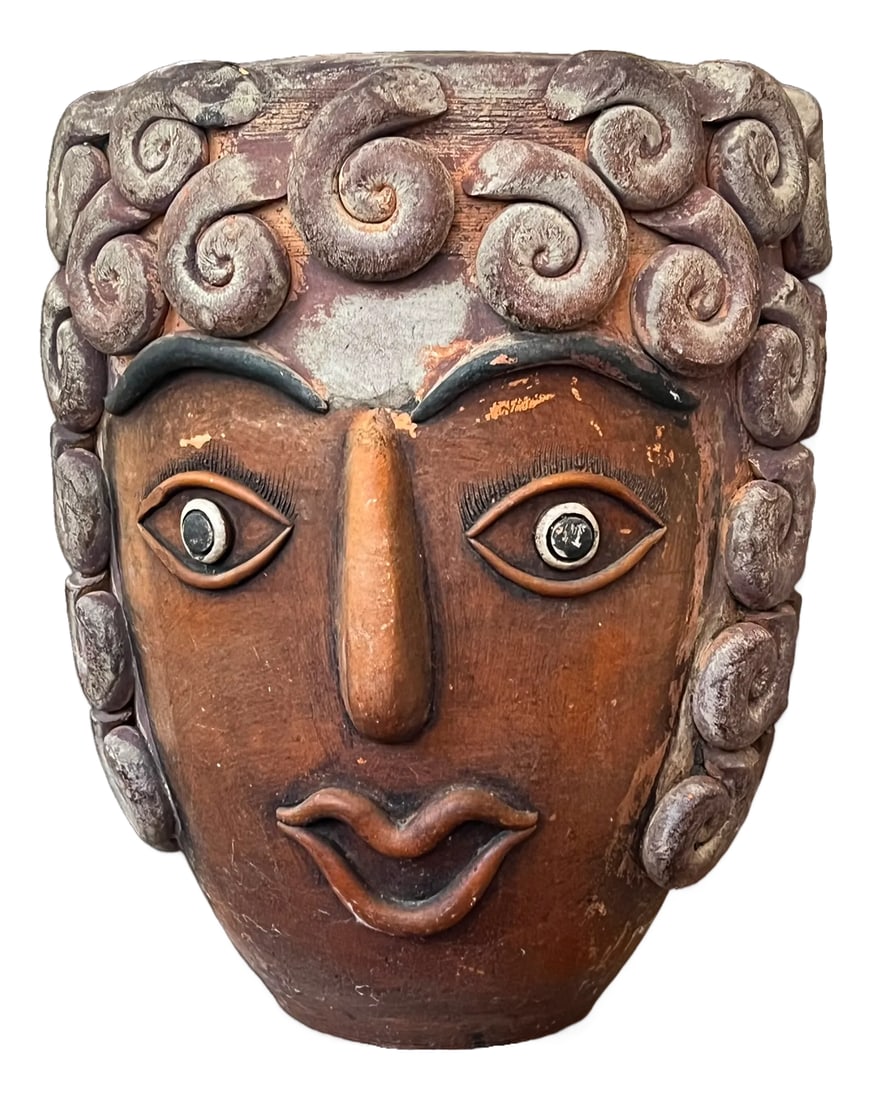 1960s Monumental Handcrafted Mexican Terra Cotta Janus Head Planter / Vessel With Spiral Relief Moti: A striking handmade terra cotta vessel featuring a sculptural Janus-style double face motif, wrapped in dramatic applied spiral relief work evocative of ram's horns, waves, or ancient Mediterranean