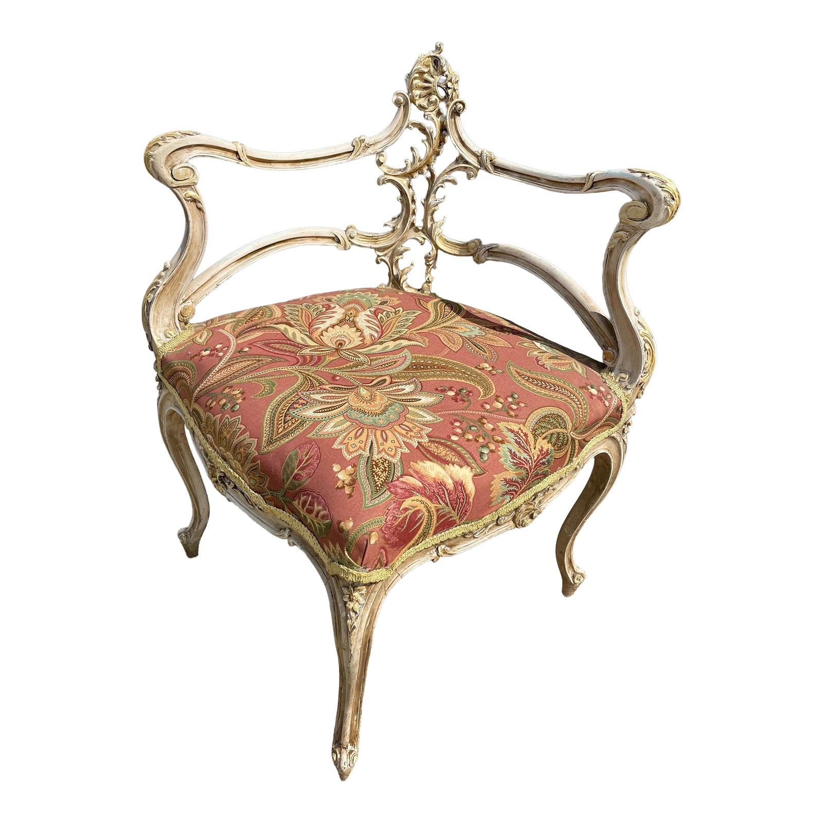 Late 19th Century French Rococo Louis XV Ornately Carved Painted Distressed Corner Captain's Chair: What a sweet, delicate, carved, petite Louis XV corner chair which has been painted in antique white with gold highlights and an intentionally distressed finish. The flowing lines are wonderfully plea