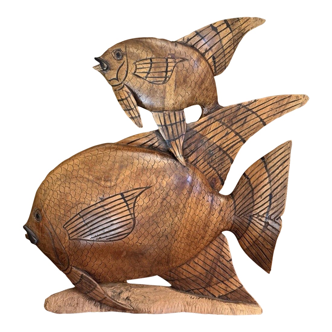 Vintage 1950s Indonesian Hand-Carved Teak Angelfish Sculpture – 19.5": This vintage Indonesian angelfish sculpture, hand-carved in the 1950s, is a striking example of mid-century tropical folk art. Featuring flowing lines and intricate, hand-chiseled details on the fins 