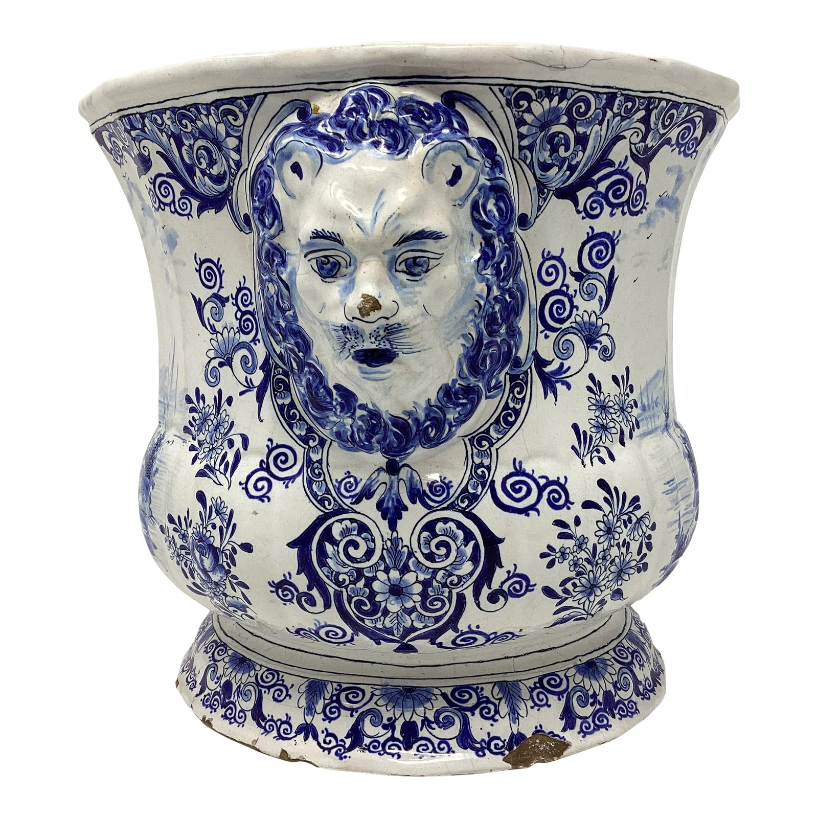 Antique Delft Faience Cache Pot: Beautifully detailed with figural lion's heads on the side. Marked I.D.A., 762, 48, on base. The trademark I.D.A. Was listed in the Trade Mark book of 1764. "The undersigned faience baker in Delft