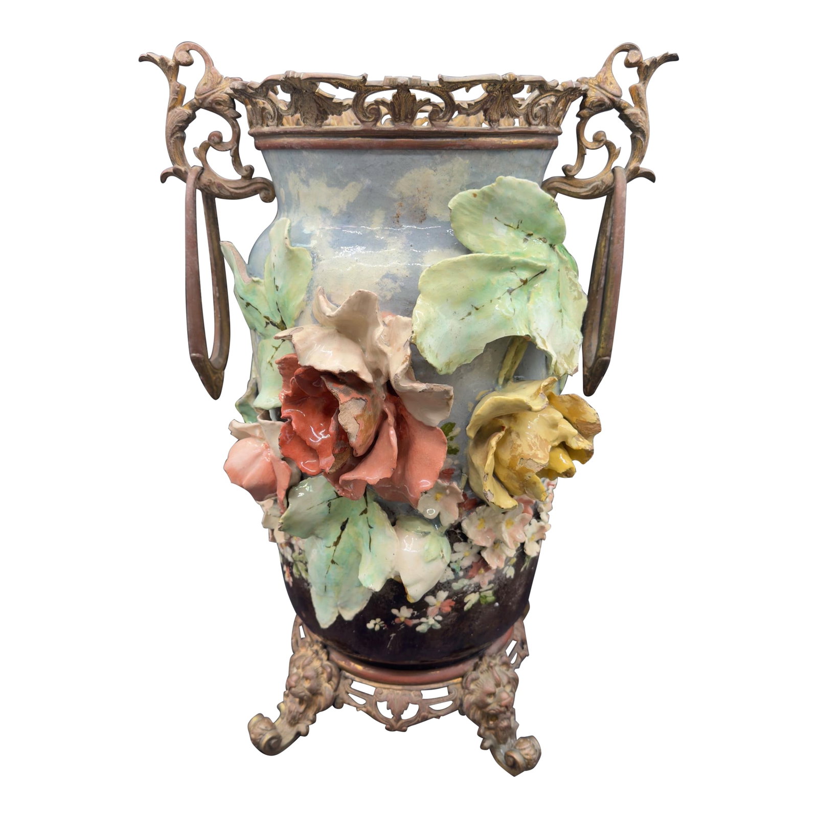 19th C French Barbitone Vase 17" H: This is a gorgeous 19 century French majolica vase featuring heavily adorned with large heavily adorned flowers and is elevated by decorative decorative guilt, bronze ormolu mounts, ornamental