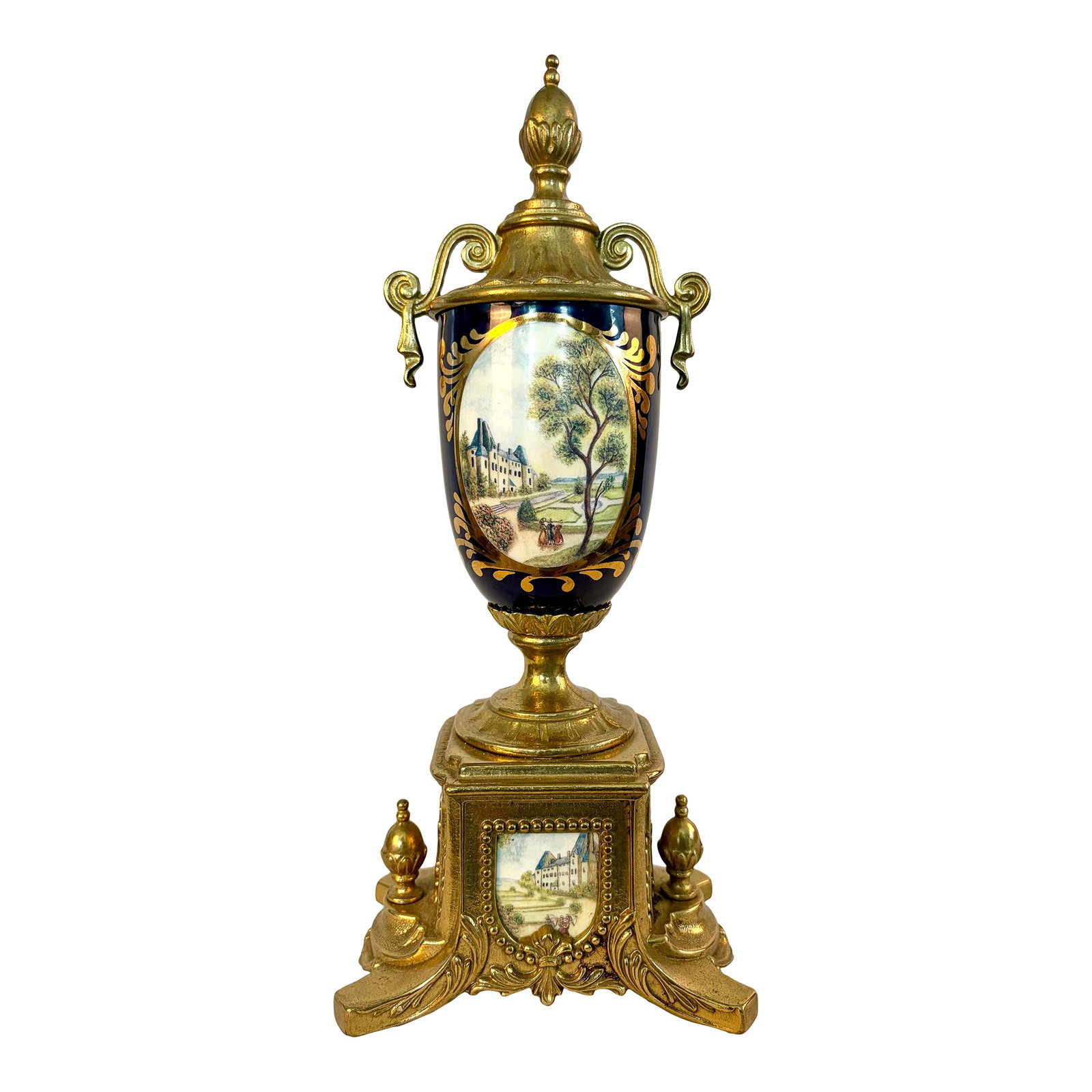 Vintage Italian Sèvres Style Hand-Painted Porcelain Urn With Ormolu Mounts: Elegantly inspired by the celebrated porcelain traditions of Sèvres, this vintage Italian decorative urn beautifully combines richly glazed cobalt porcelain with finely cast ormolu-style mounts