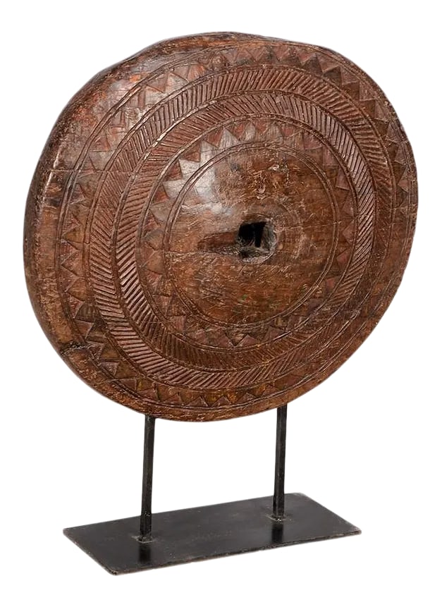 Antique Wagon Wheel on Metal Stand | Farmhouse Country Log Cabin Décor | Primitive Display: Dimensions: 32"³ W x 10"³ D x 40"³ H Hand carved wheel from the 1800s is mounted on an iron stand. The wear is consistent of age and use. The listed dimensions are measured from one