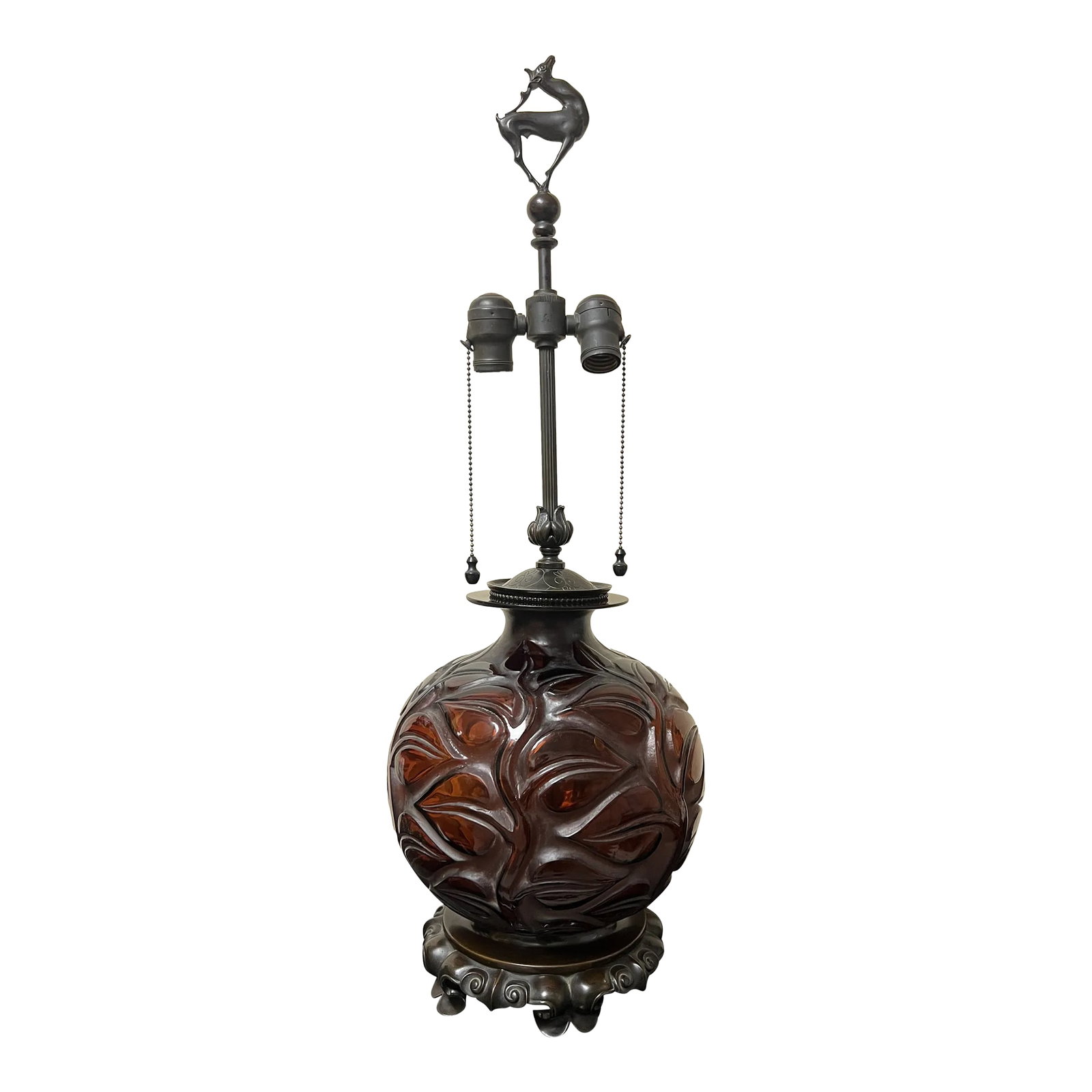 Rene Lalique "Sophora" Amber Glass & Bronze Mounted Table Lamp Circa 1926: Rene Lalique (French, 1860-1945). A beautiful Amber glass and whiteish patina around the foliate leaves. The glass vase is mounted with a bronze chinoiserie base, acanthus leaf stem support, dual sock