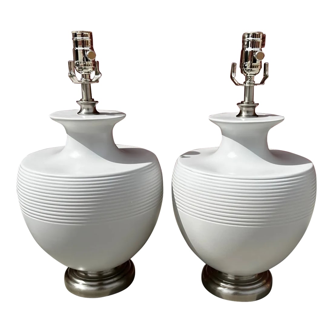 Modern Gray Urn Table Lamps-A Pair: Perfect set of Light Gray and Chrome Modern Urn Table Lamps. Ribbed detail at the top of lamps and a chrome base and hardware. Would look amazing in a modern home. 19in h x 9in diameter 5in base Make