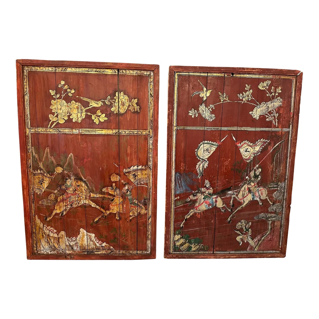 Pair of Distressed Antique Chinese Hand Painted Wooden Panels: Stunning pair of distressed antique Chinese hand painted wooden panels having red backgrounds and figural decoration of warriors on horseback in black, white and green. Condition: Alterations: