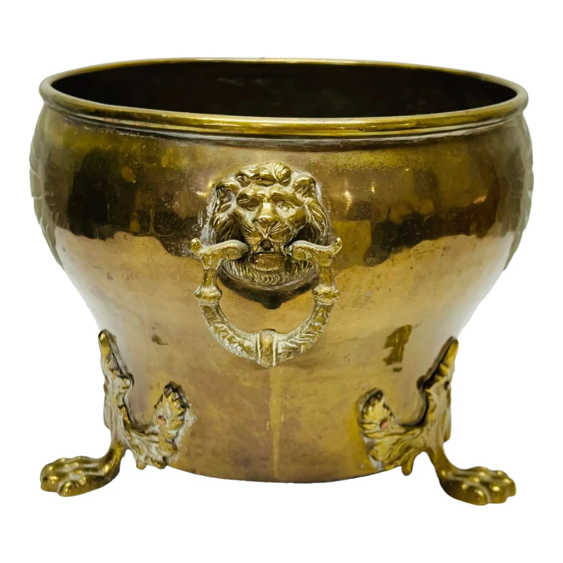 Rare Late 19th Century Imperial Russian Hand Hammered Brass Cachepot With Lion Head Mounts.: Beautiful and rare Imperial Russian hand hammered jardiniere / cachepotwith three lion head mounts and 3 wing like paw feet. In rarely used condition. Measures 8.5" diameter x 7.5" h. Nice weight