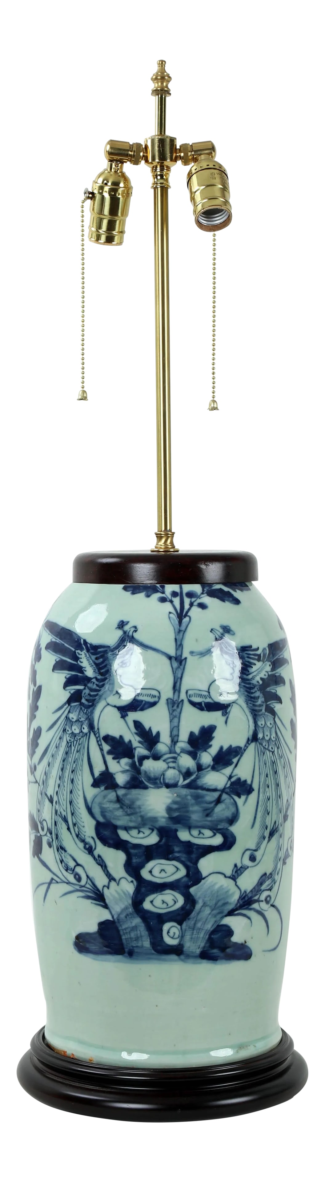 19 Century Double Bulb Pull Chain Celadon Blue and White Bird Motif Porcelain Lamp: This celadon blue and white porcelain lamp is decorated on just the front, depicting a pair of ornate birds enjoying a fountain that is bountiful with food and water. Condition: Alterations: Original