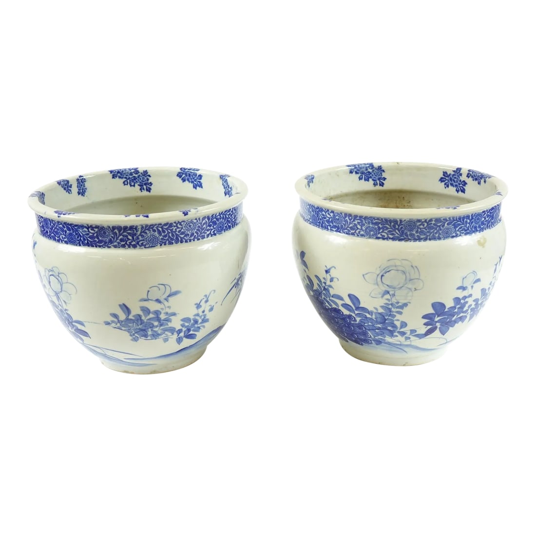 18th Century Blue and White Chinese Vases - a Pair: This pair of 18th-century Chinese porcelain vases features exquisite blue floral designs on both the body and lid. The classic blue and white color scheme highlights the intricate artistry of the