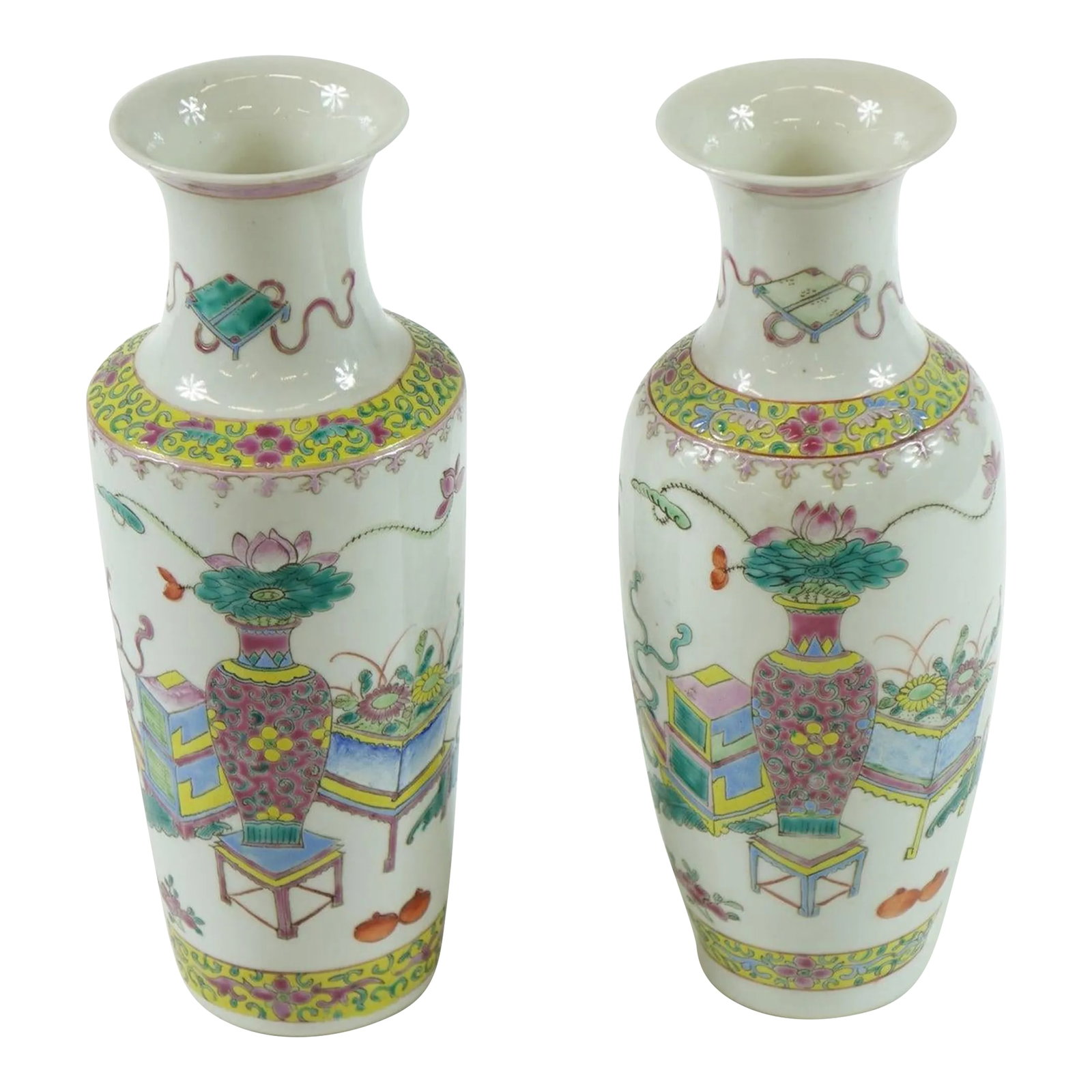 Early 20th Century Chinese Porcelain Vases - A Pair: This elegant pair of Early 20th Century Chinese porcelain vases embodies the exquisite craftsmanship of the period. Each vase features a harmonious blend of pastel hues, showcasing intricate designs