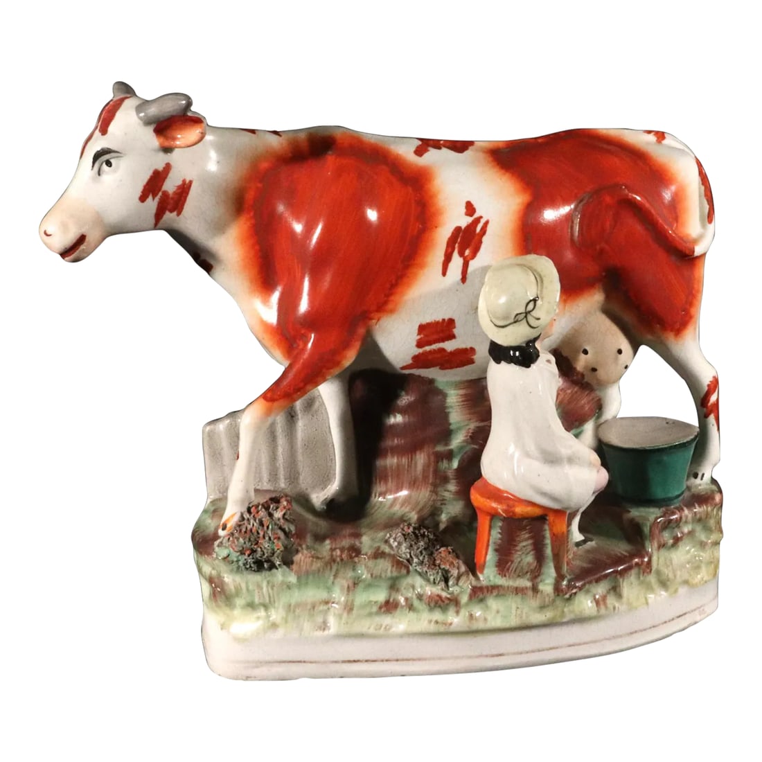 Staffordshire Pottery Cow Figure With Milkmaid: Large Victorian Staffordshire Pottery Figure Group: Cow and Milkmaid This charming and sizable figure group, dating from the Victorian period (circa 1860–1880), is a classic example of popular