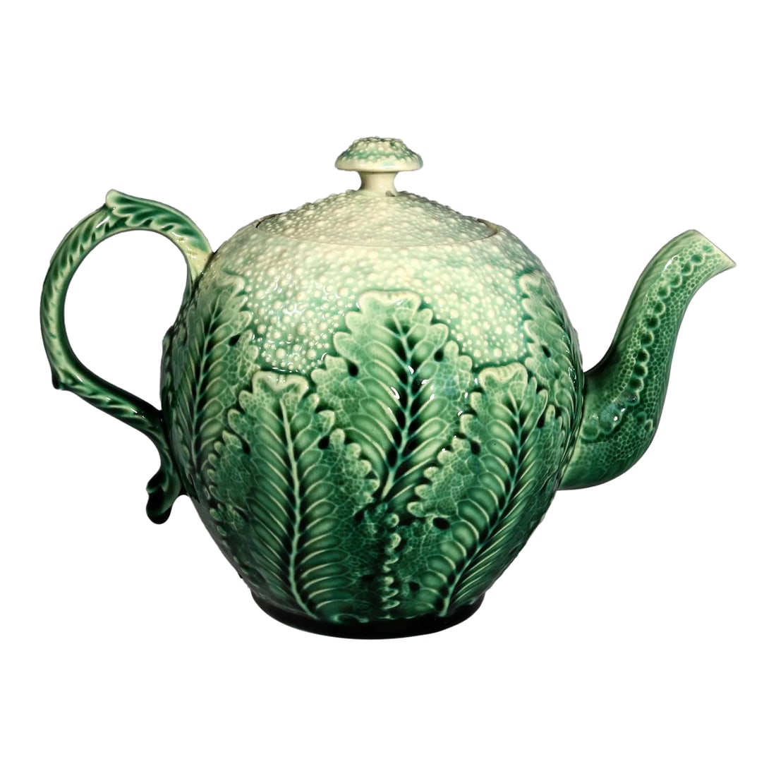 American Etruscan Majolica Teapot in the Form of a Cauliflower: American Etruscan Majolica Teapot in the form of a Cauliflower, Early Majolica-type body, Circa 1879 The green molded tromp L'oeil teapot is designed as a small cauliflower, the sides with