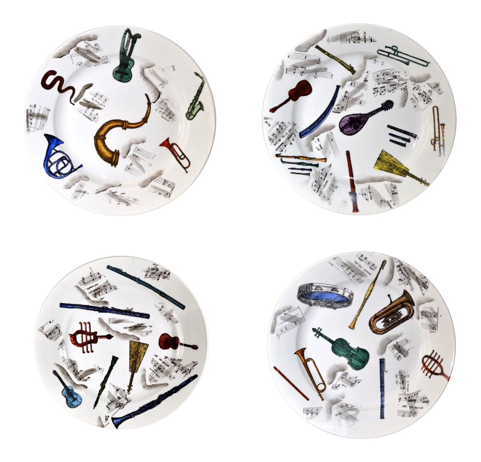 Early 1950s Piero Fornasetti Musical Pottery Plates - Set of 4: Early Piero Fornasetti Set of Four Musical Pottery Plates, Circa 1953 (Ref: NY9279/apr) The set of plates depict six different designs of different musical instruments spread across the surface with